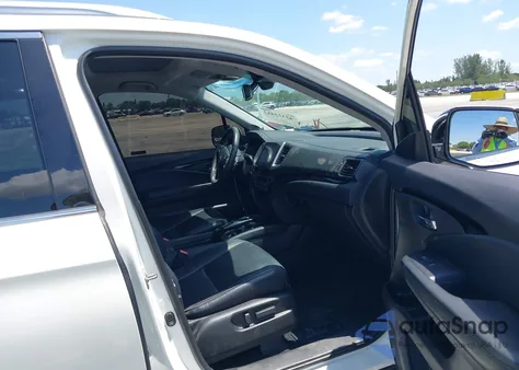 2018 Honda Pilot Elite z USA, uszkodzony, nr VIN 5FNYF6H00JB058623